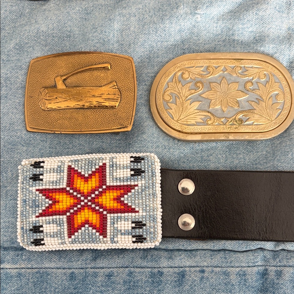 Brown leather belt with assorted buckles